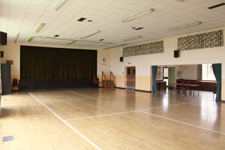 The spacious Main Hall, with raised stage, separate lounge, bar and kitchen facilities